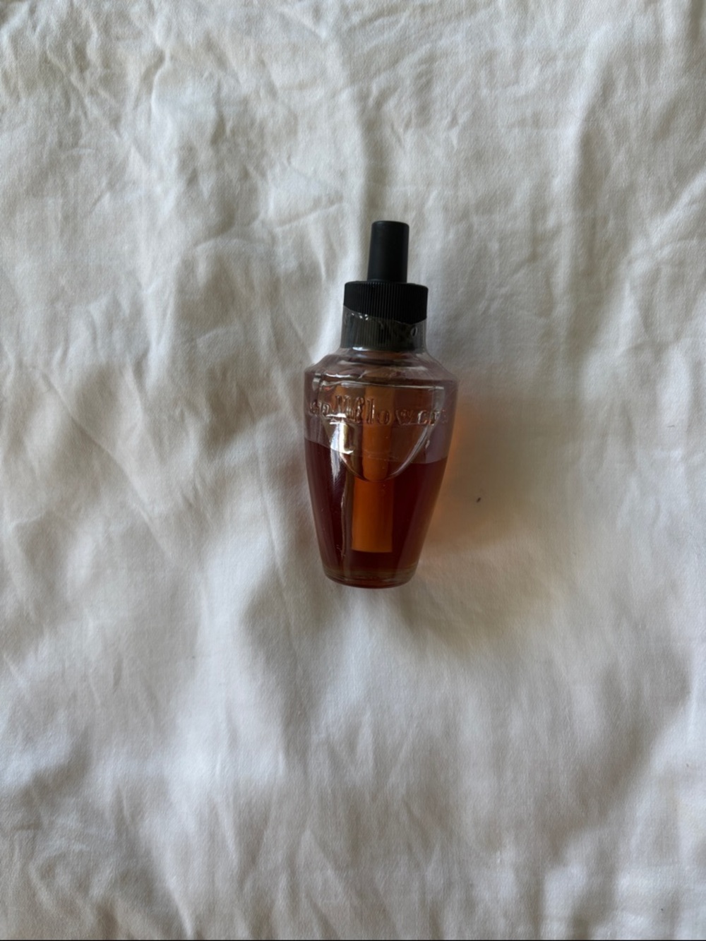 Bath & Body Works amber glass dropper bottle with black cap